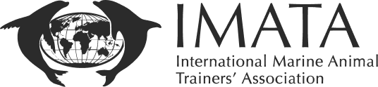 Logo with two dolphins around a globe, text: IMATA, International Marine Animal Trainers' Association.