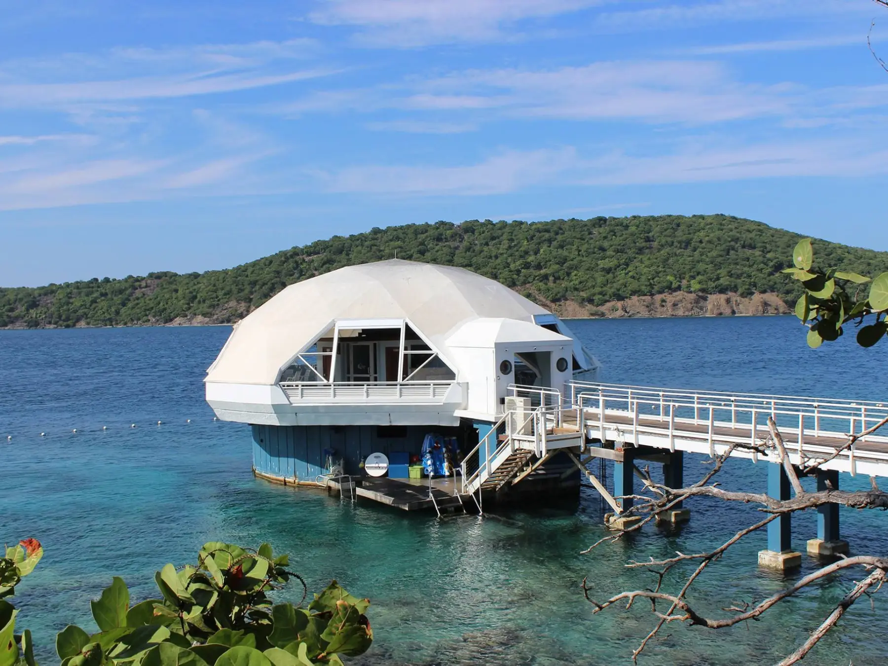 a boat is docked next to a body of water