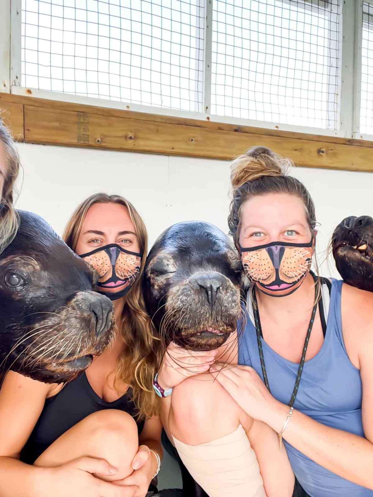 a group of people sitting posing for the camera