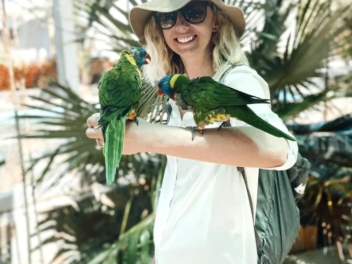 a person holding a bird