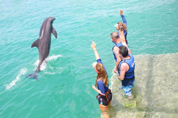 a man and woman swimming in the water