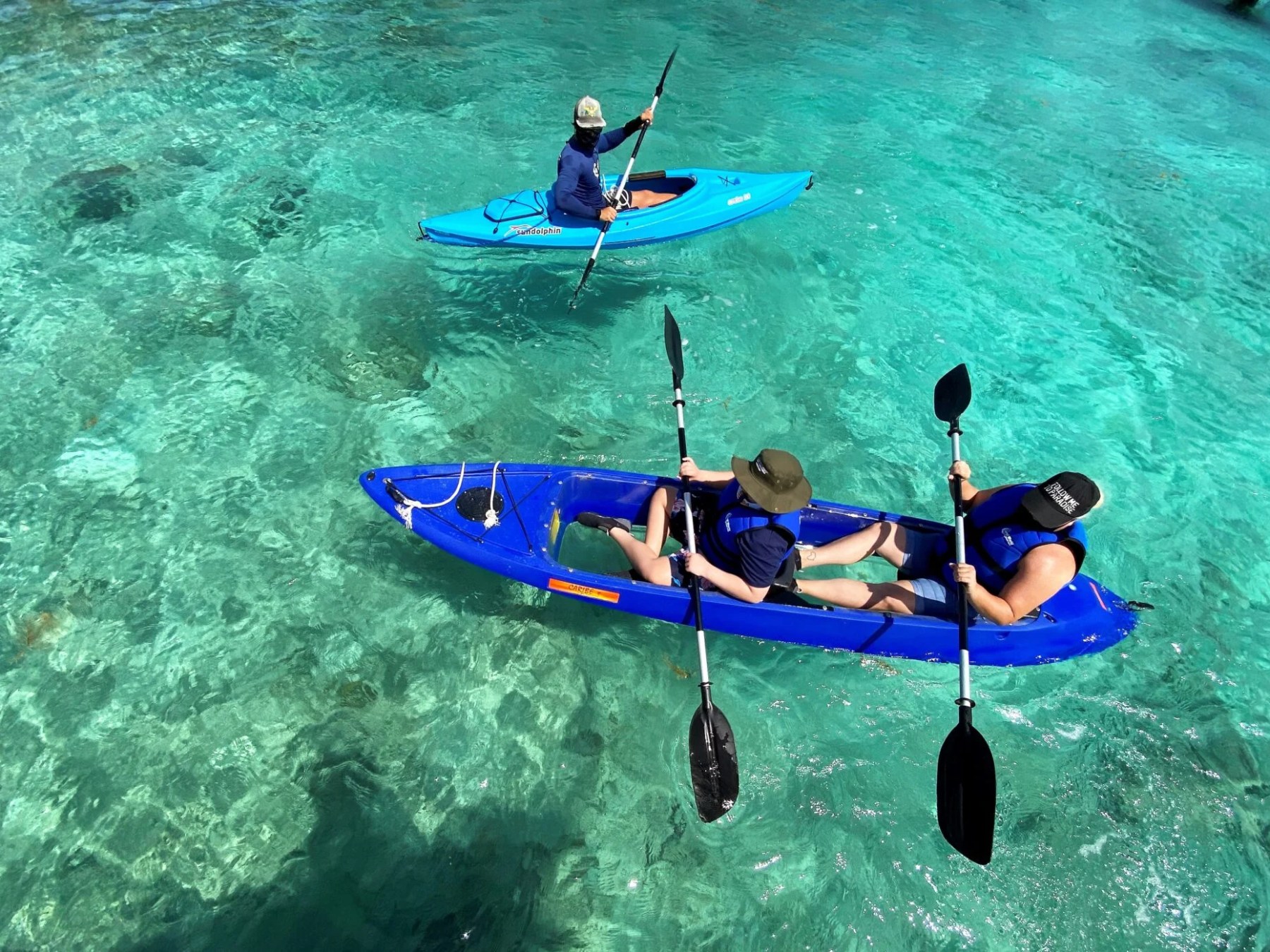 a person in a blue pool of water