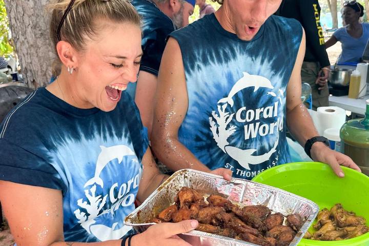 a young boy cutting a cake