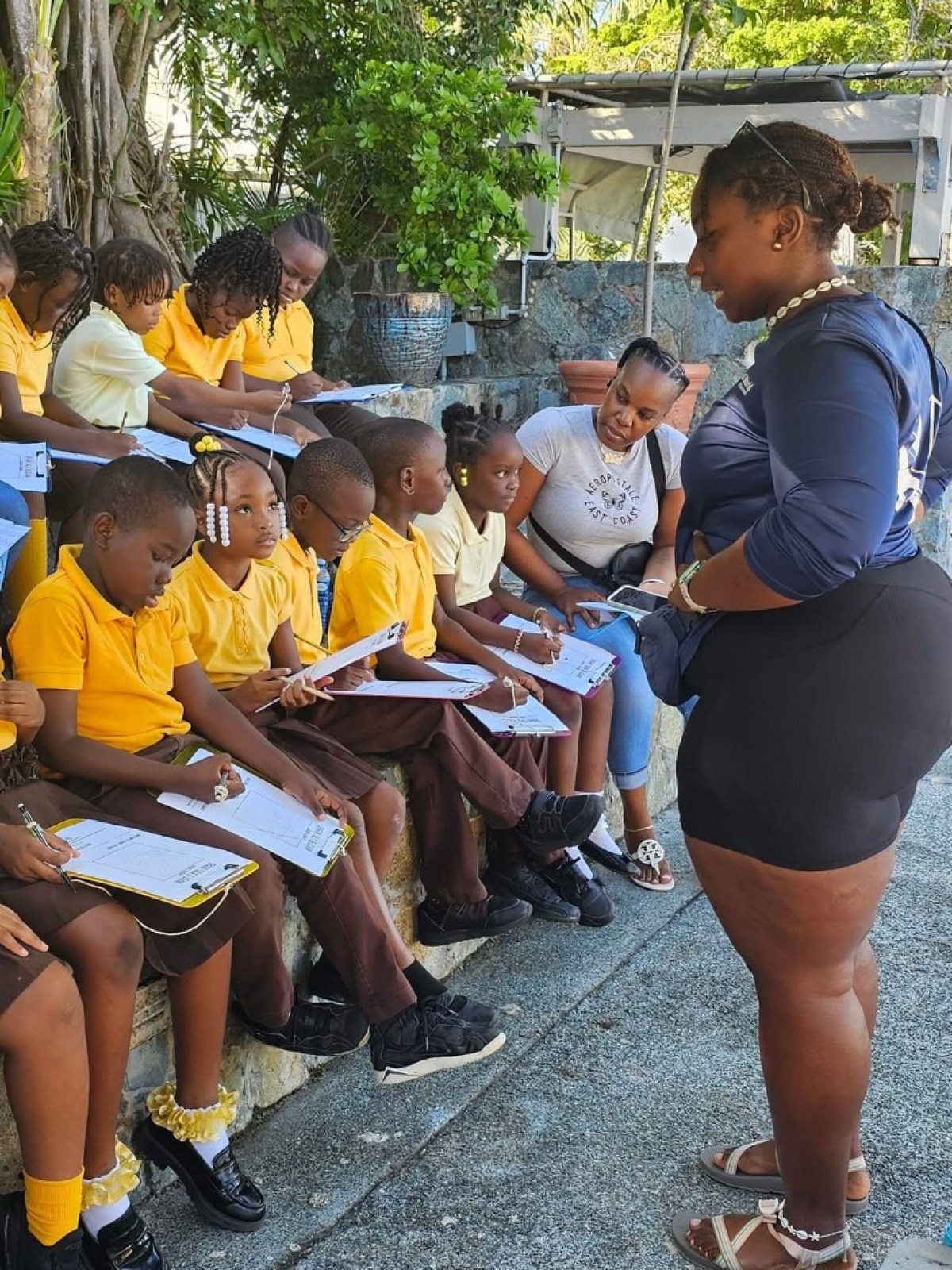 a group of people sitting on a bench